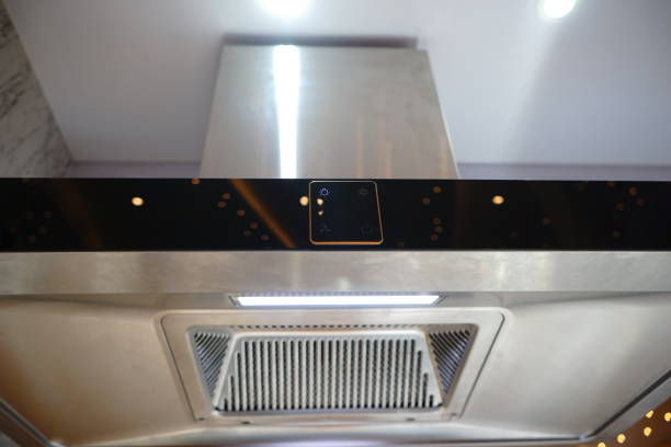 istock Closeup of modern kitchen exhaust fan 1156287928