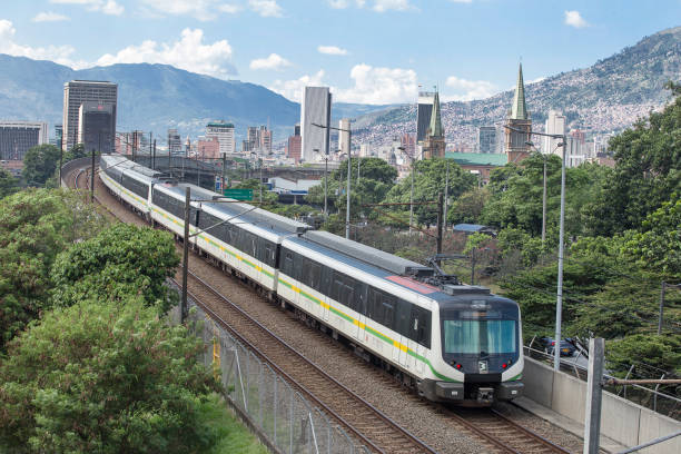 Medellín is the capital of the mountainous province of Antioquia (Colombia). Nicknamed the "city of eternal spring" for its temperate climate, annually hosts the Flower Fair. Medellin, Antioquia / Colombia - August 03, 2017. Metro mass transit in the city metro medellin stock pictures, royalty-free photos & images