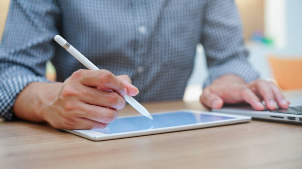 istock close up on graphic designer student hand drawing on digital tablet screen for create and learning artwork form webinar of education online concept 1156291966