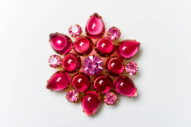 Vintage Chic Vintage brooch with pink cabochons and rhinestones. costume jewelry stock pictures, royalty-free photos & images