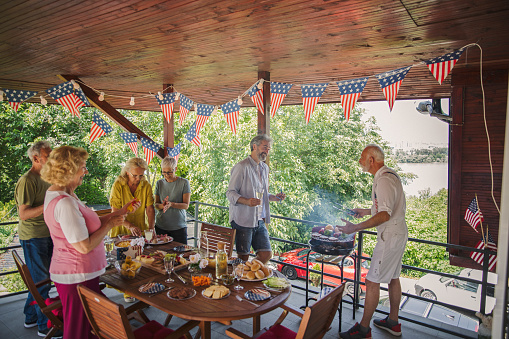 Senior friends celebrating US Independence Day