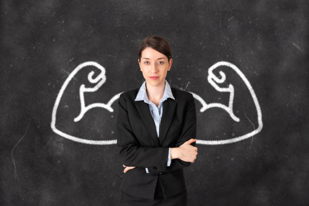istock Strong businesswoman with drawn powerful arms 1156294079