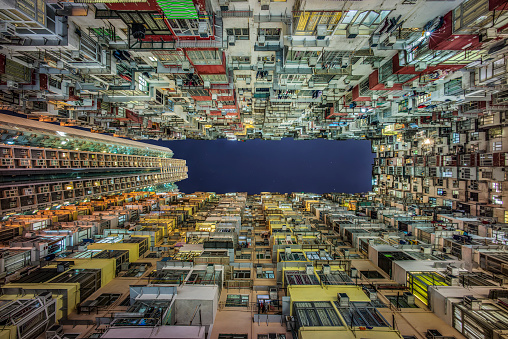 looking up between crowded Hong Kong apartments
