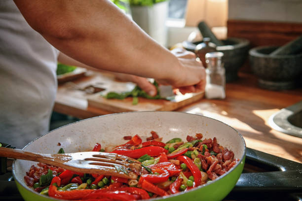 istock Preparing Frittata with Paprika, Spring Onions, Peas, Spinach and Parmesan 1156299014