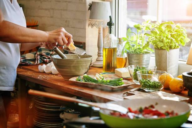 istock Preparing Frittata with Paprika, Spring Onions, Peas, Spinach and Parmesan 1156299025