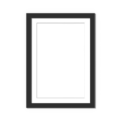 Black picture frame isolated on white with thin white mat