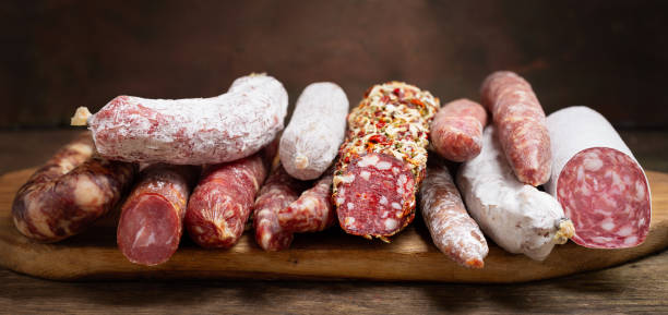 istock Various kind types of salami and sausages 1156301401