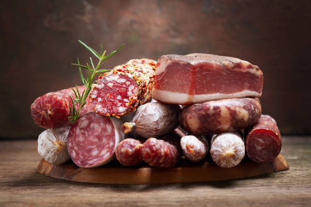 istock Various kind types of salami, speck and sausages 1156301427