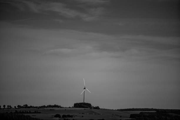 istock wind turbine in the white and black nature 1156301488