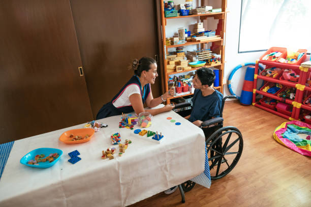 istock Children with development difficulties in special day care 1156301637