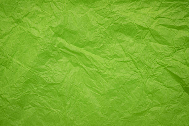 istock crumpled and wrinled green paper 1156302648