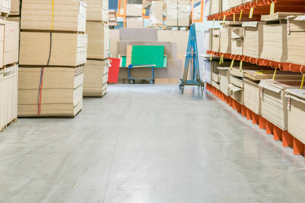 istock fiberboard and chipboard sheets on shelves in the building materials store. 1156304645
