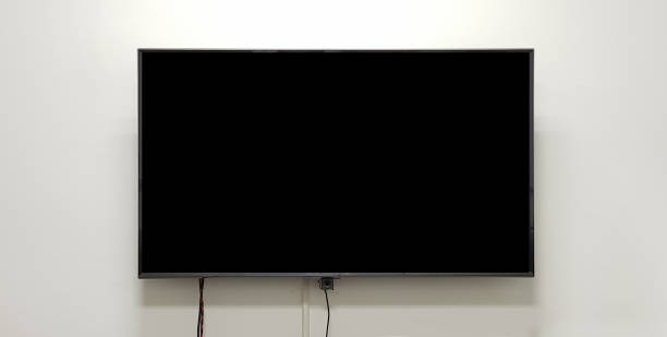 istock Smart TV Mockup, modern LED TV hanging on the wall 1156304694