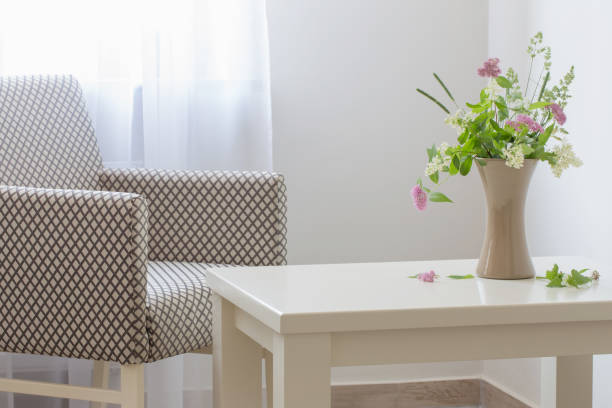 istock summer flowers in vase on table 1156314504