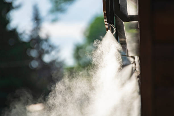istock water spray system for cooling in a public cafe at the boiling hot summer days 1156320777