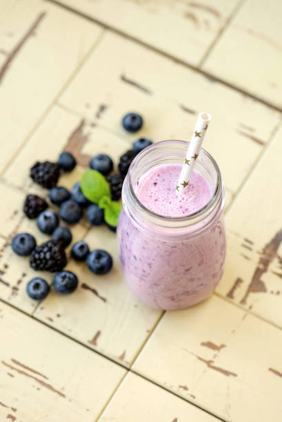 istock Blueberry smoothie in bottle 1156323083