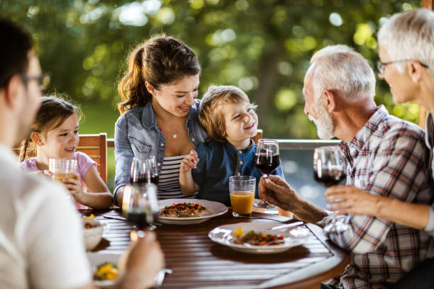 istock Enjoying in family's lunch on a balcony! 1156324192