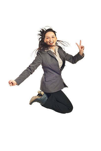 istock Executive jumping and show victory sign 115632493