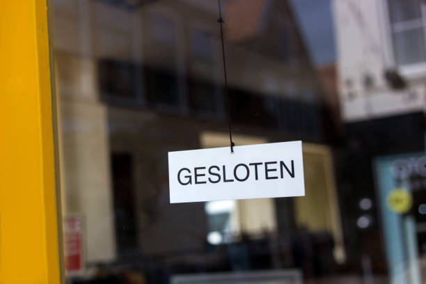 Dutch Sign on Door/Window: "Gesloten" (Closed) stock photo