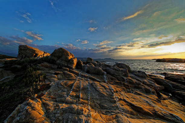 Sunset on rocks in Punta di Spano