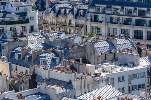 Paris, view of typical roofs of the French capital, ancient and modern buildings