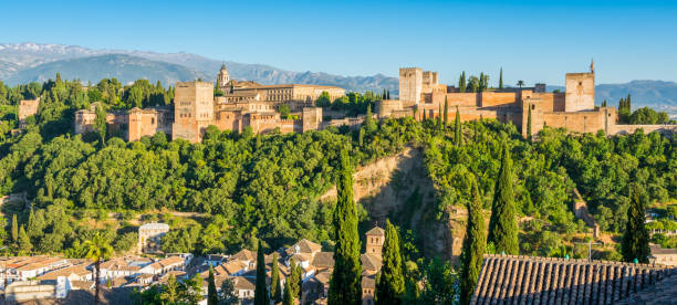 Panoramic sight of the Alhambra Palace in Granada as seen from the Mirador San Nicolas. Andalusia, Spain. stock photo