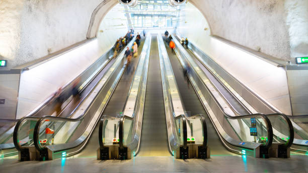 istock Blurred motion, train station platform escalators, Stockholm city 1156330057