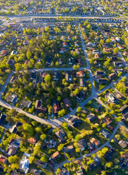 istock Top view, flying over idyllic villa area early morning 1156330073