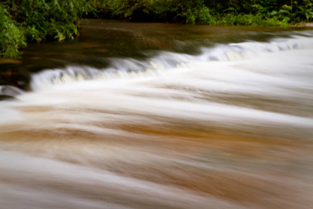 istock late summer landscape with river and waterfalls 1156332177