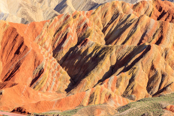 istock Multiple colored sandstone hills during a hot summer day 1156332853