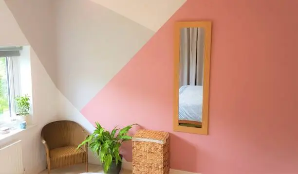 Photo of Bedroom with painted geometric pattern