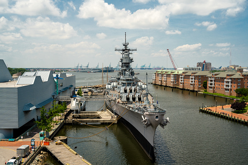 Norfolk, VA, USA -- June 6, 2019. The battleship USS Wisconsin is berthed in Norfolk, VA next to Nauticus.