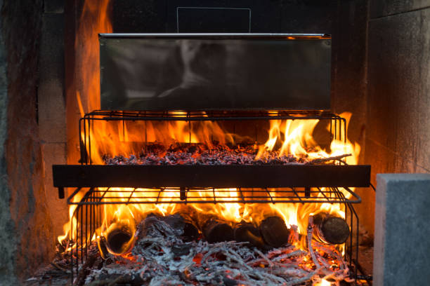 istock Domestic smokehouse with open fire 1156338504