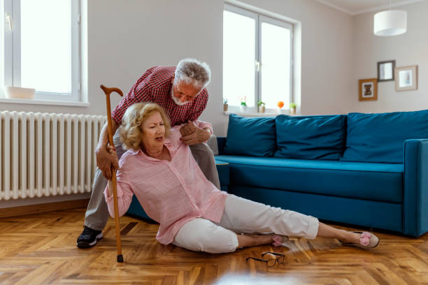 istock Old men helping wife who falled down on floor 1156343029