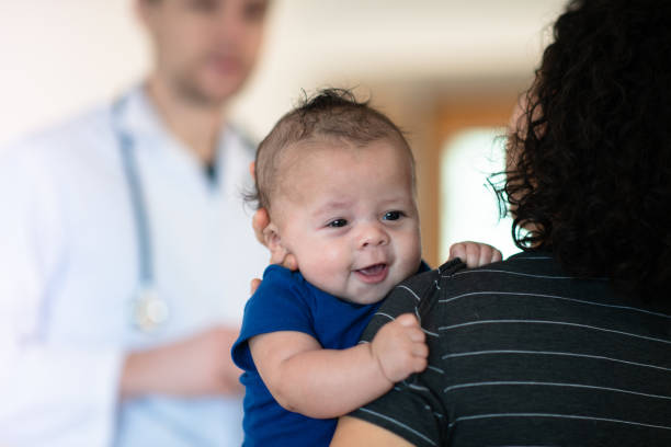 istock Mother holding her toddler 1156350122
