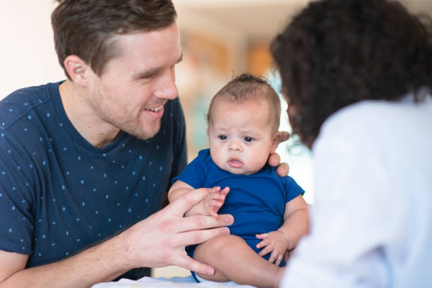 istock Doctor gives baby a checkup 1156350125