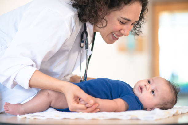istock Doctor gives baby a checkup 1156350128