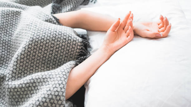 istock leisure recreation woman sleeping covered face 1156351330