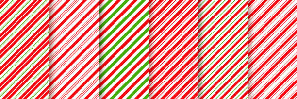 Cane candy seamless pattern. Vector red green illustration. Cane candy pattern. Vector. Christmas seamless background.  Stripes diagonal red green wrapping paper. Abstract texture. Holiday traditional peppermint backdrop. Sugar lollipop illustration. candy cane striped stock illustrations