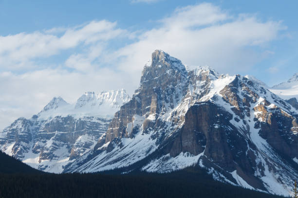 istock Jagged mountain peaks partially covered with snow 1156351745