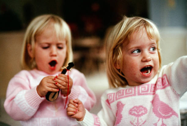 sisters playing and laughing together