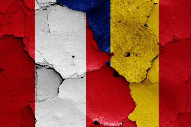 istock flags of Peru and Romania painted on cracked wall 1156362374