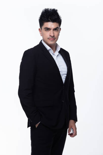 istock Business Man Stand in dark Black proper Suit 1156369443