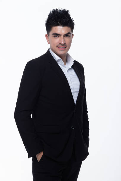 istock Business Man Stand in dark Black proper Suit 1156369475