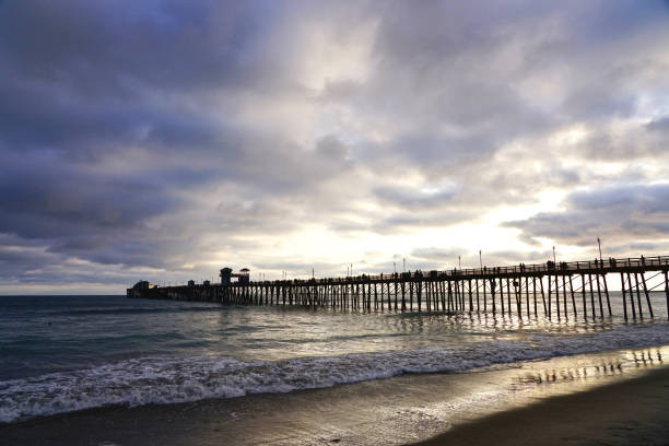 istock The ocean view, pier bridge playground and sunset 1156370036