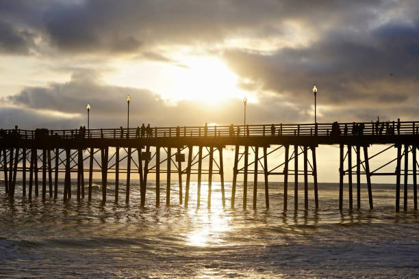 istock The ocean view, pier bridge playground and sunset 1156370090