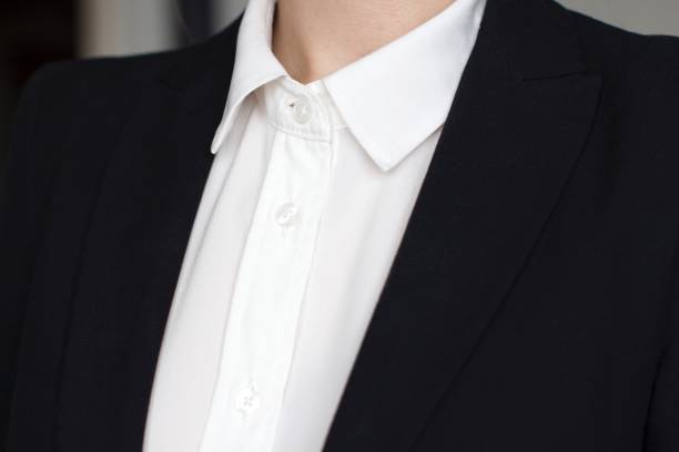 istock young woman in a black suit 1156370367