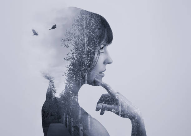 istock Multiple Exposure of young woman and nature 1156376701