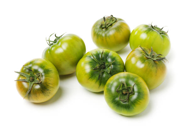 istock fresh green tomato isolated on white background 1156379509