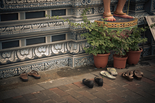 footwears in front of temple